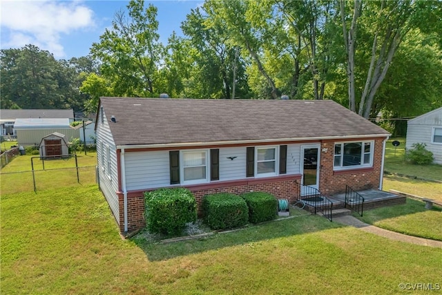 1007 Bolton Rd, Richmond, VA 23225 - view of front facade featuring brick siding and roof with shingles