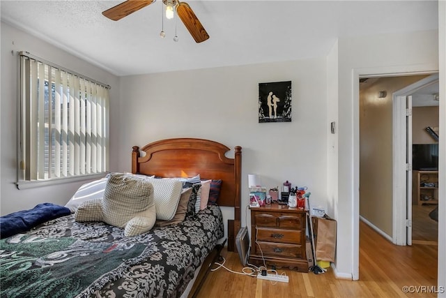 1007 Bolton Rd, Richmond, VA 23225 - bedroom with wood finished floors and ceiling fan
