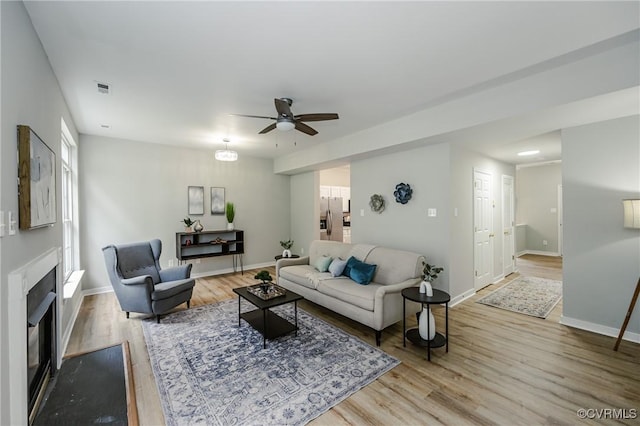 11405 Friars Walk Ct, Glen Allen, VA 23059 - living room featuring ceiling fan, wood finished floors, and a fireplace