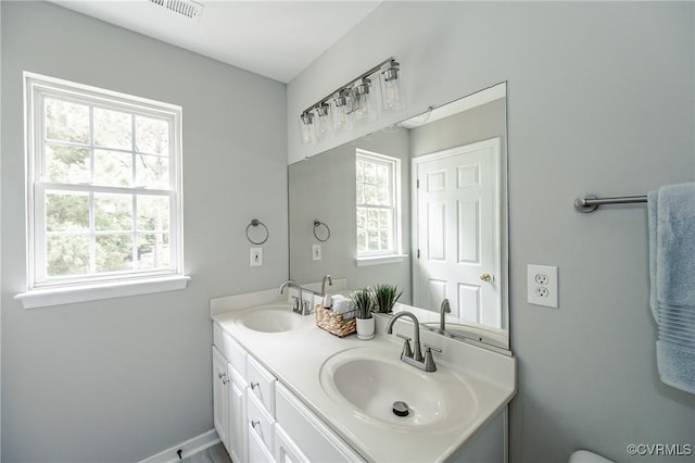 11405 Friars Walk Ct, Glen Allen, VA 23059 - bathroom with double vanity and baseboards