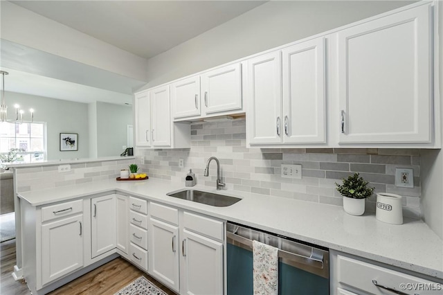 11405 Friars Walk Ct, Glen Allen, VA 23059 - kitchen featuring stainless steel dishwasher, a peninsula, white cabinetry, wood finished floors, and decorative backsplash
