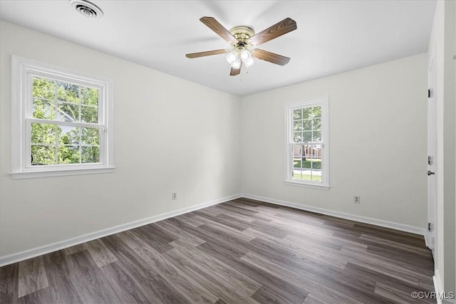 1915 Bogese Dr, Petersburg, VA 23805 - spare room featuring dark wood-style flooring and ceiling fan