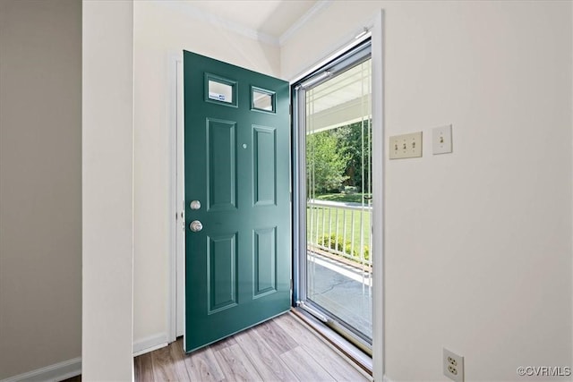 1915 Bogese Dr, Petersburg, VA 23805 - entrance foyer with light wood-type flooring and crown molding