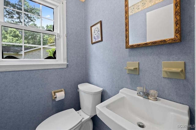 1915 Bogese Dr, Petersburg, VA 23805 - half bathroom with a sink and toilet