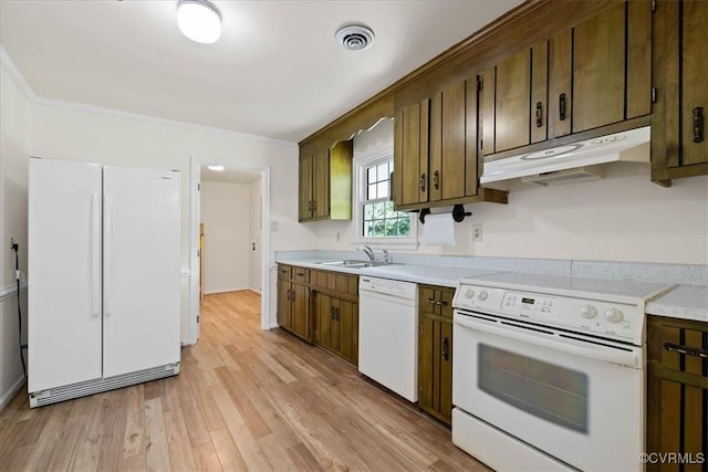 1915 Bogese Dr, Petersburg, VA 23805 - kitchen featuring white appliances, under cabinet range hood, light countertops, crown molding, and light wood-style flooring
