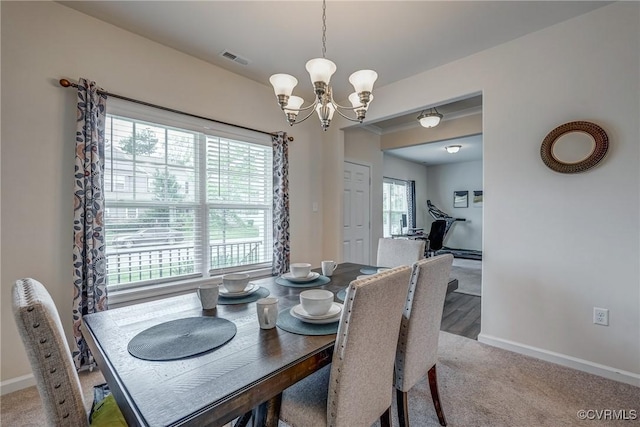 6989 Sir Galahad Rd, Henrico, VA 23231 - dining area with a chandelier and carpet