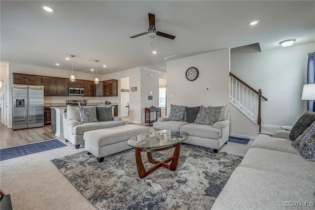 6989 Sir Galahad Rd, Henrico, VA 23231 - living area with ceiling fan, stairs, recessed lighting, and light carpet