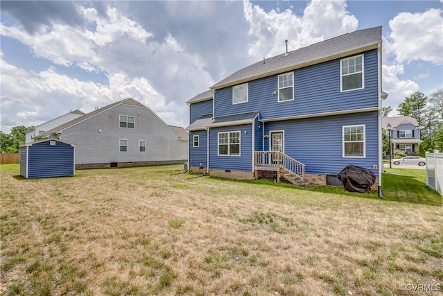 6989 Sir Galahad Rd, Henrico, VA 23231 - rear view of property featuring a lawn and a storage unit