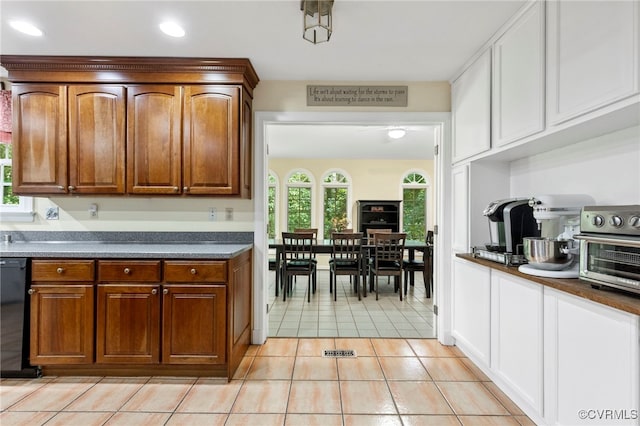 4018 Timber Ridge Rd, Chesterfield, VA 23112 - kitchen featuring light tile patterned floors, dark countertops, black dishwasher, brown cabinetry, and recessed lighting