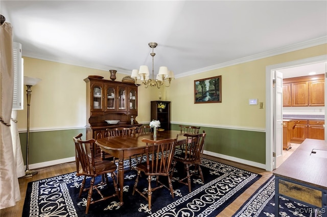 4018 Timber Ridge Rd, Chesterfield, VA 23112 - dining space featuring a chandelier, light wood finished floors, and crown molding