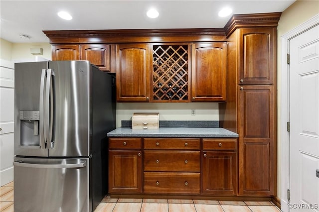 4018 Timber Ridge Rd, Chesterfield, VA 23112 - kitchen featuring stainless steel refrigerator with ice dispenser, dark countertops, light tile patterned floors, and recessed lighting