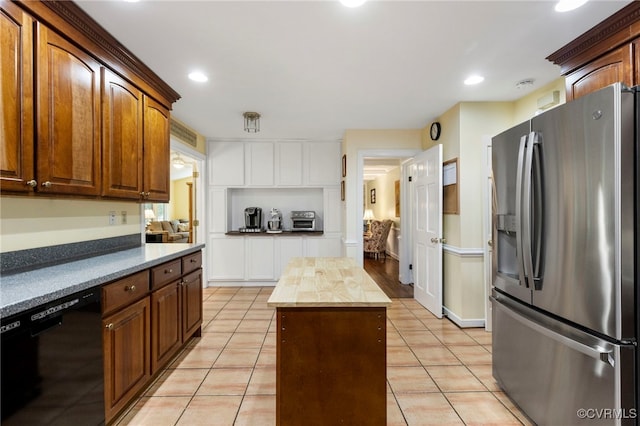 4018 Timber Ridge Rd, Chesterfield, VA 23112 - kitchen featuring stainless steel refrigerator with ice dispenser, dishwasher, light tile patterned floors, recessed lighting, and wooden counters
