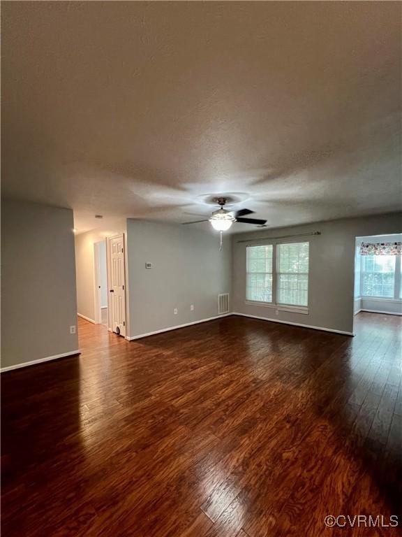 3218 Matilda Cv Unit 108, Richmond, VA 23294 - spare room with dark wood-type flooring and ceiling fan