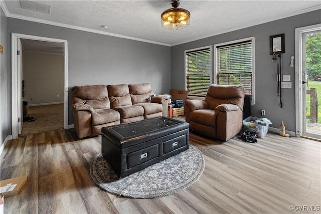 566 Will Johnson Rd, Louisa, VA 23093 - living room featuring wood finished floors and ornamental molding