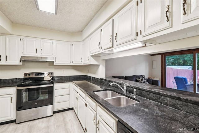 12302 Sir James Ct, Henrico, VA 23233 - kitchen with stainless steel range with electric cooktop, under cabinet range hood, a textured ceiling, white cabinetry, and light wood-type flooring