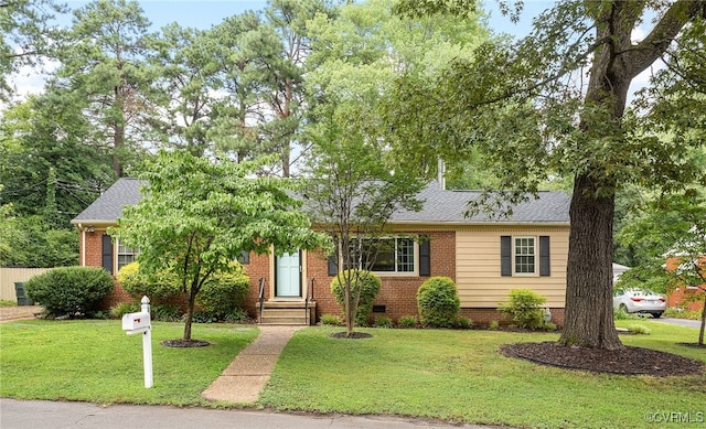 8314 Erma Ln, Richmond, VA 23229 - view of front facade with a front yard, a shingled roof, and brick siding