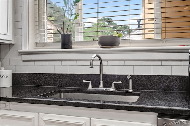 8314 Erma Ln, Richmond, VA 23229 - kitchen view of white cabinetry, tasteful backsplash, and dishwasher