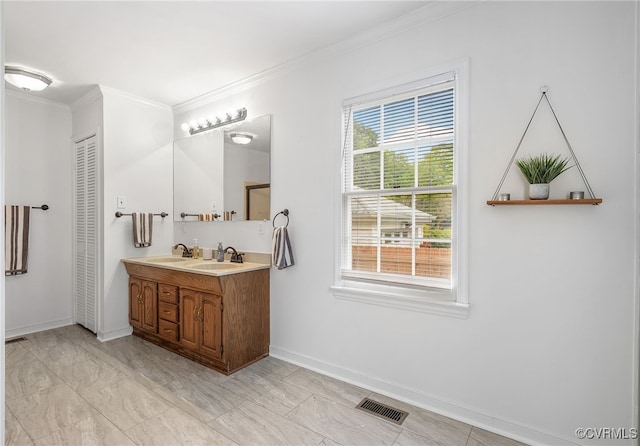 8314 Erma Ln, Richmond, VA 23229 - bathroom featuring double vanity and ornamental molding