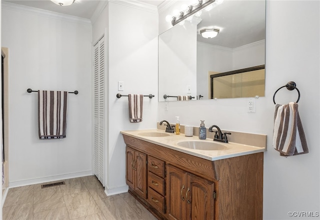 8314 Erma Ln, Richmond, VA 23229 - full bath with double vanity, a closet, crown molding, and marble finish flooring
