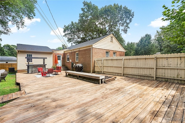 8314 Erma Ln, Richmond, VA 23229 - wooden deck featuring a fenced backyard and area for grilling