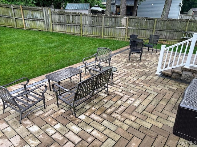 2205 Cox Rd, Henrico, VA 23233 - fenced backyard with a patio