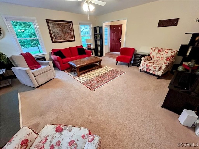 2205 Cox Rd, Henrico, VA 23233 - carpeted living area with healthy amount of natural light and a ceiling fan