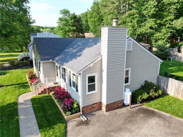 2205 Cox Rd, Henrico, VA 23233 - back of property with a chimney, roof with shingles, and view of scattered trees