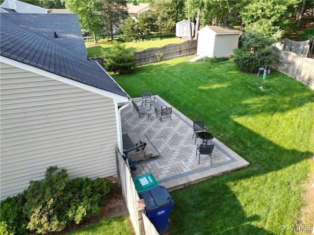 2205 Cox Rd, Henrico, VA 23233 - fenced backyard with a storage unit and a patio