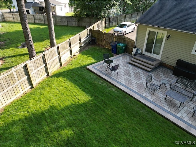2205 Cox Rd, Henrico, VA 23233 - fenced backyard with a patio area