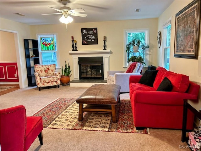 2205 Cox Rd, Henrico, VA 23233 - living area with carpet floors, a glass covered fireplace, and ceiling fan