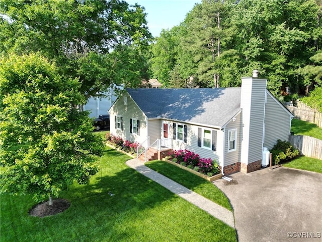 2205 Cox Rd, Henrico, VA 23233 - single story home featuring a chimney, a shingled roof, and driveway