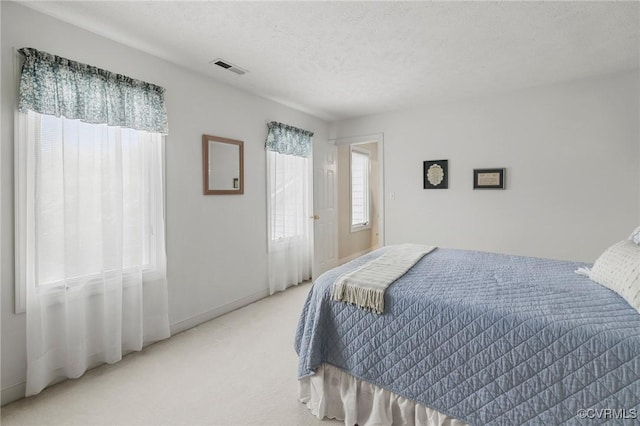 4723 Squaw Valley Ct, Glen Allen, VA 23060 - bedroom with carpet floors and a textured ceiling