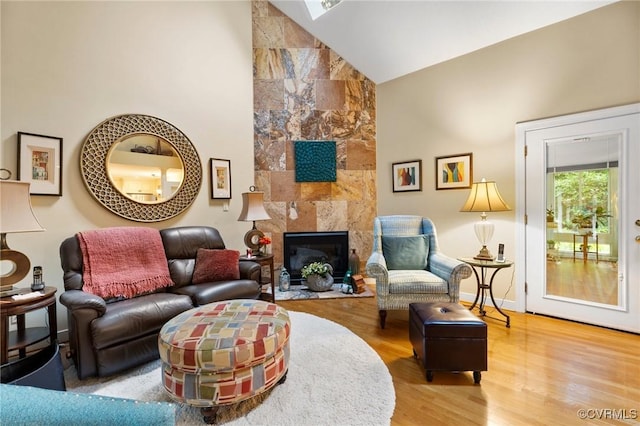 4723 Squaw Valley Ct, Glen Allen, VA 23060 - living area with high vaulted ceiling, light wood finished floors, and a fireplace
