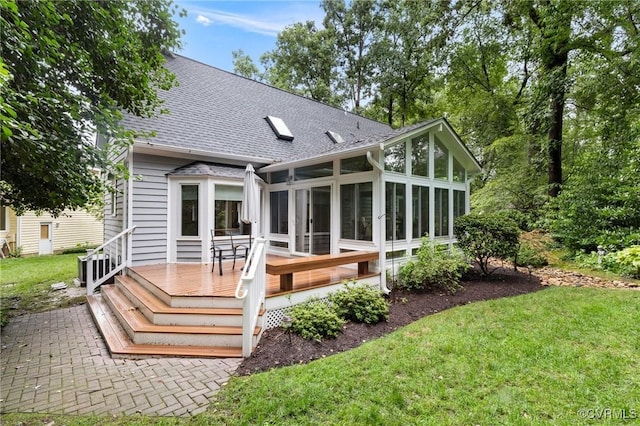 4723 Squaw Valley Ct, Glen Allen, VA 23060 - back of property featuring a sunroom, roof with shingles, a deck, and a lawn