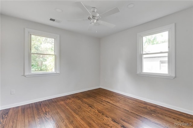 1409 Virginia Ave, Glen Allen, VA 23060 - unfurnished room with healthy amount of natural light, dark wood finished floors, and ceiling fan
