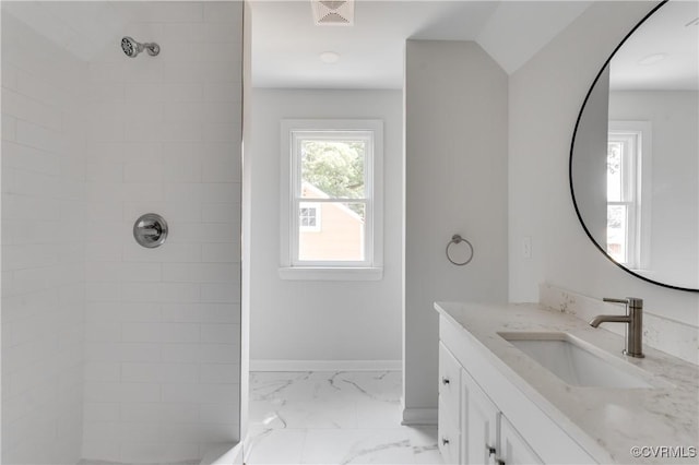 1409 Virginia Ave, Glen Allen, VA 23060 - bathroom with vanity, tiled shower, and marble finish floors