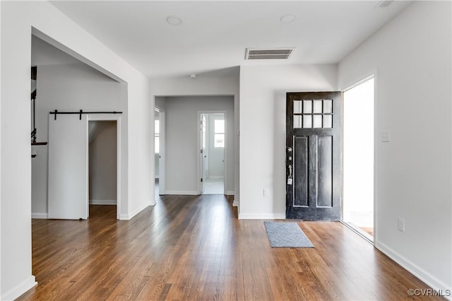 1409 Virginia Ave, Glen Allen, VA 23060 - foyer entrance with a barn door and wood finished floors