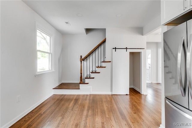 1409 Virginia Ave, Glen Allen, VA 23060 - staircase featuring wood finished floors and a barn door