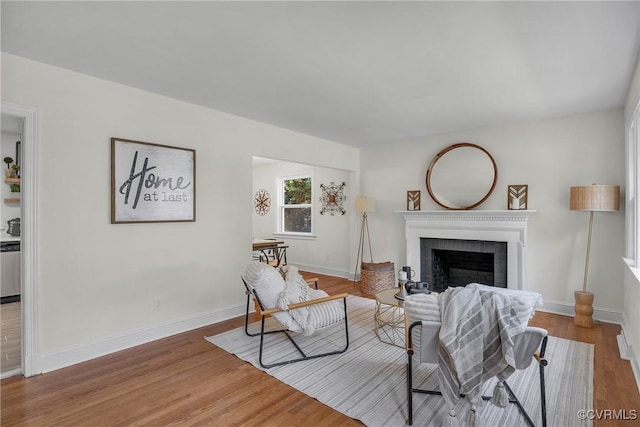 8912 Michaux Ln, Henrico, VA 23229 - living room featuring a fireplace and wood finished floors