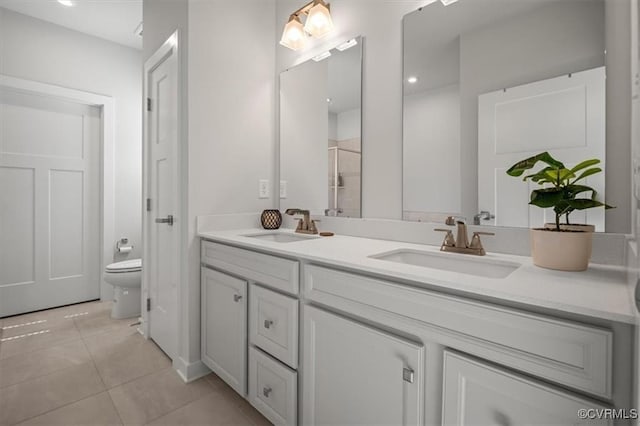 7653 Autumn Leaves Ln, New Kent, VA 23124 - full bathroom with double vanity, tile patterned floors, and a shower