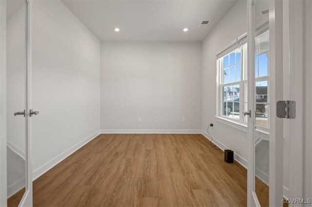 7653 Autumn Leaves Ln, New Kent, VA 23124 - unfurnished room with light wood finished floors and recessed lighting