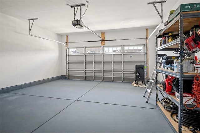 7653 Autumn Leaves Ln, New Kent, VA 23124 - garage with a garage door opener and baseboards
