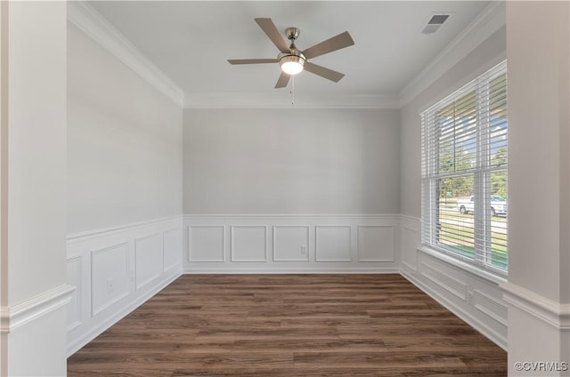 7095 Shining Armor Dr, Henrico, VA 23231 - empty room with crown molding, a ceiling fan, wainscoting, a decorative wall, and dark wood-style flooring