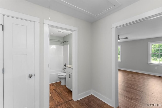 699 Trimmers Shop Rd, King William, VA 23181 - hallway featuring attic access and dark wood finished floors