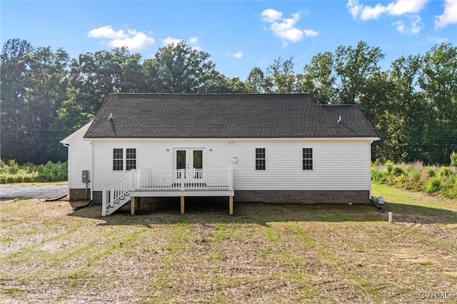699 Trimmers Shop Rd, King William, VA 23181 - rear view of house featuring a deck, french doors, a lawn, and a shingled roof
