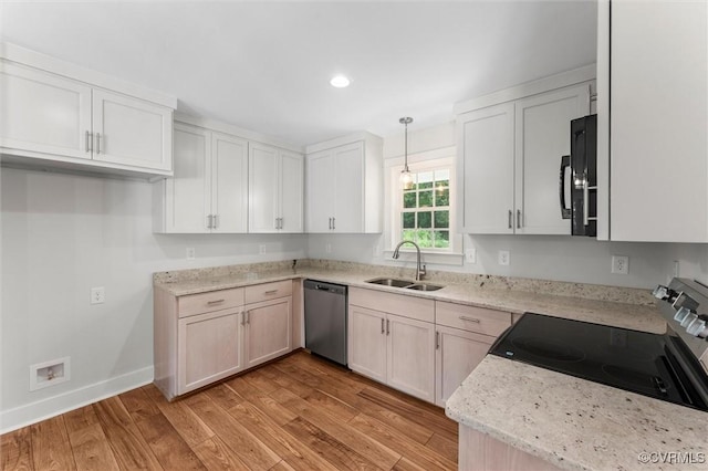 699 Trimmers Shop Rd, King William, VA 23181 - kitchen featuring dishwasher, range with electric cooktop, light wood-style floors, light stone countertops, and decorative light fixtures