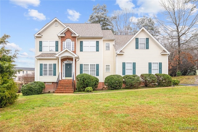 14313 Woodleigh Dr, Chester, VA 23831 - traditional-style home featuring a front lawn and a shingled roof