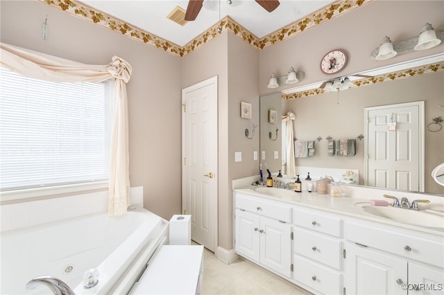 14313 Woodleigh Dr, Chester, VA 23831 - full bathroom featuring double vanity, a tub with jets, a ceiling fan, and tile patterned flooring