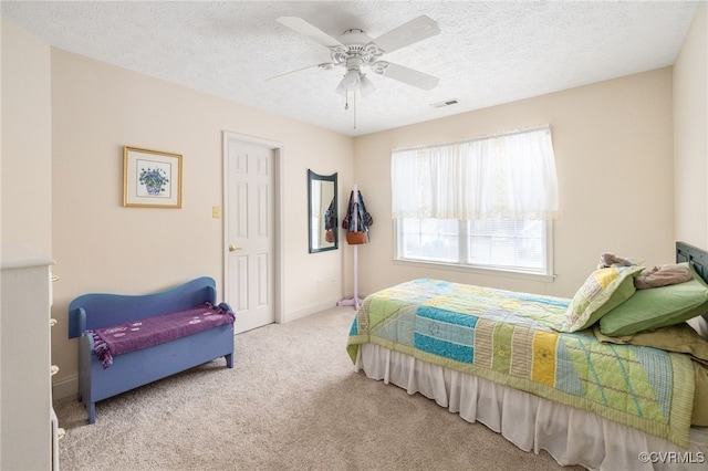 14313 Woodleigh Dr, Chester, VA 23831 - carpeted bedroom with a textured ceiling and a ceiling fan