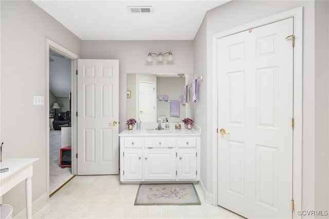 14313 Woodleigh Dr, Chester, VA 23831 - bathroom with vanity and baseboards